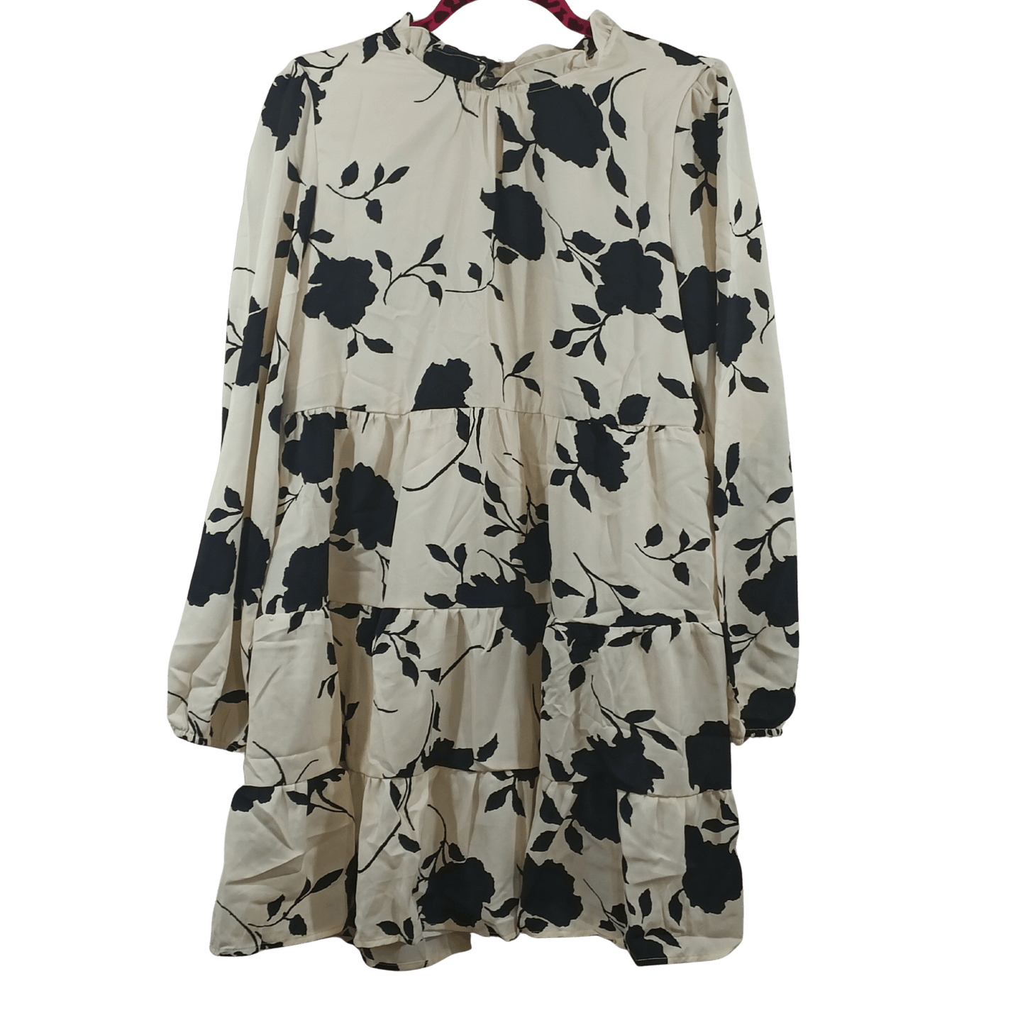 Beige dress with black floral pattern on a transparent background