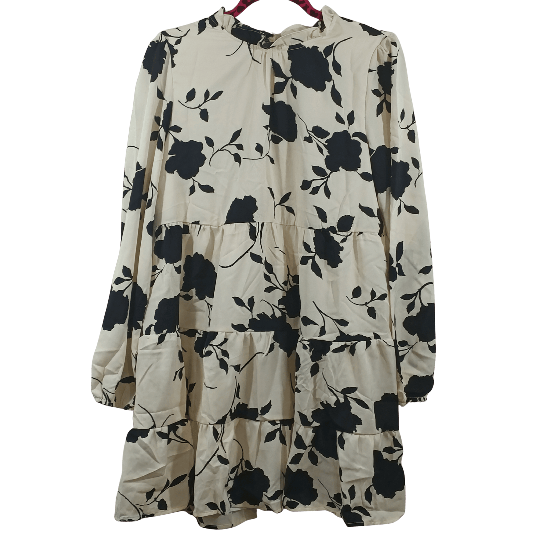 Beige dress with black floral pattern on a transparent background