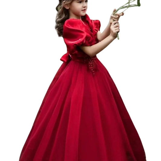 Red dress worn by a young girl on a white background