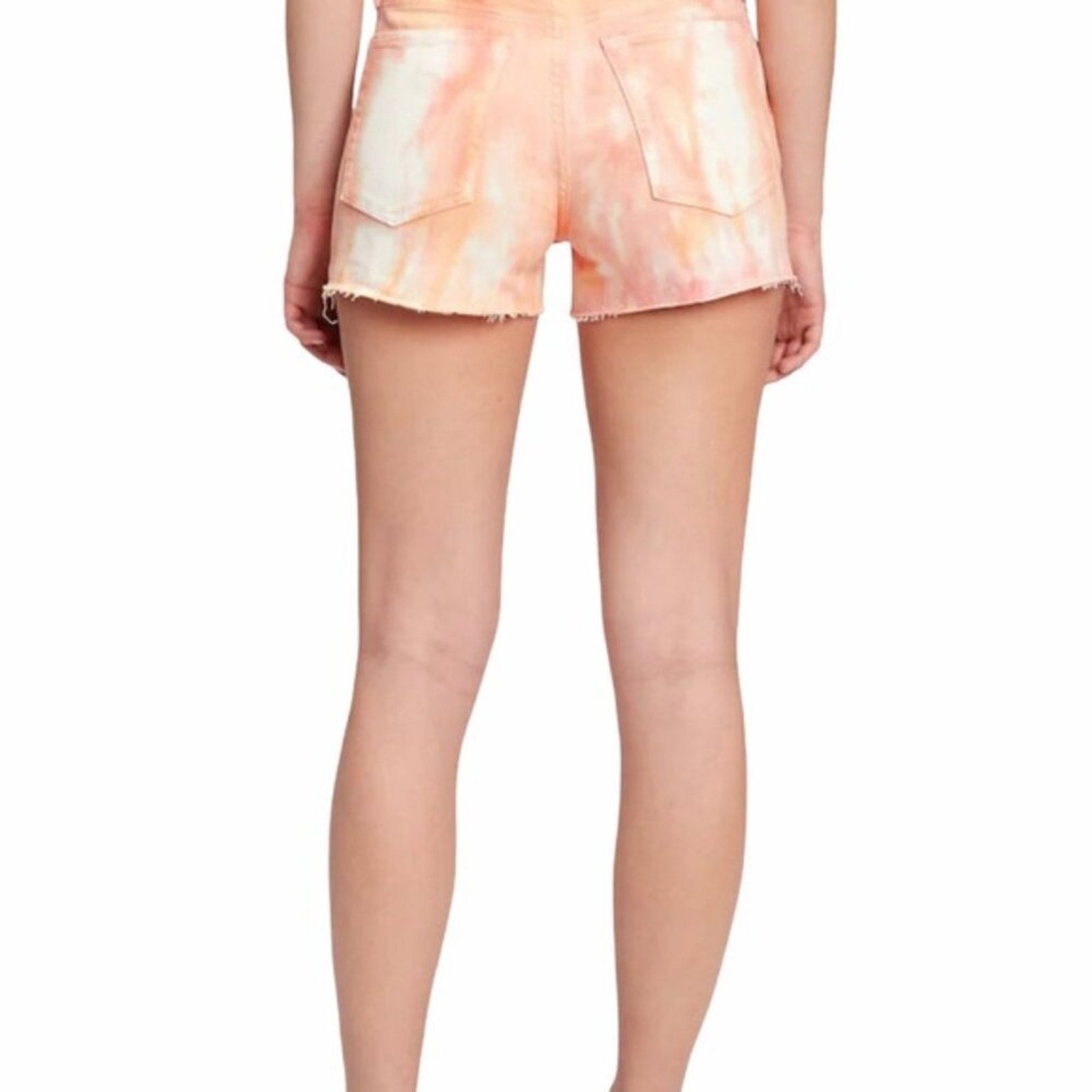 Tie-dye shorts worn by a person on a white background