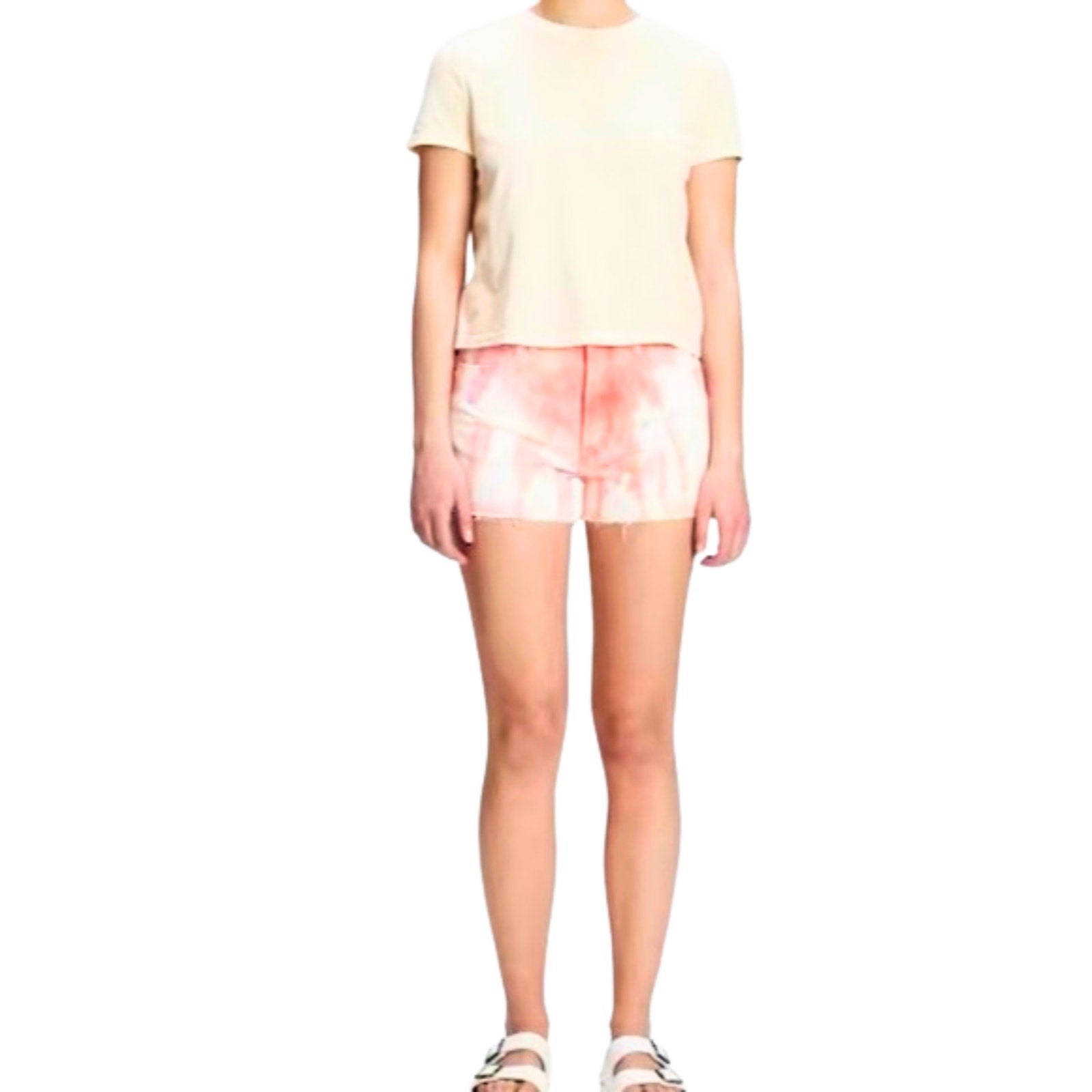 Person wearing a light-colored t-shirt and tie-dye shorts on a white background