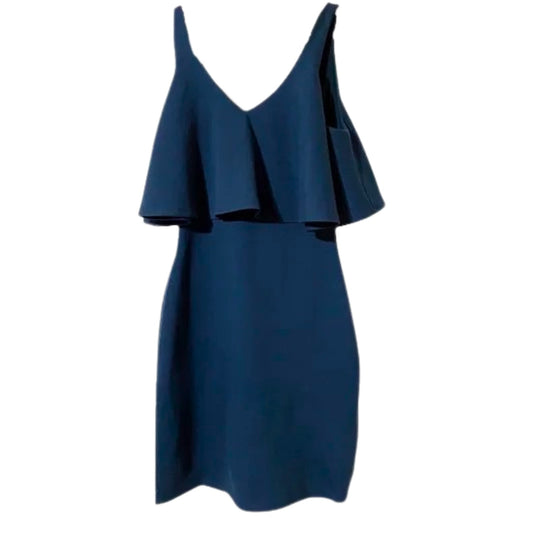 Blue dress with ruffled details on a white background