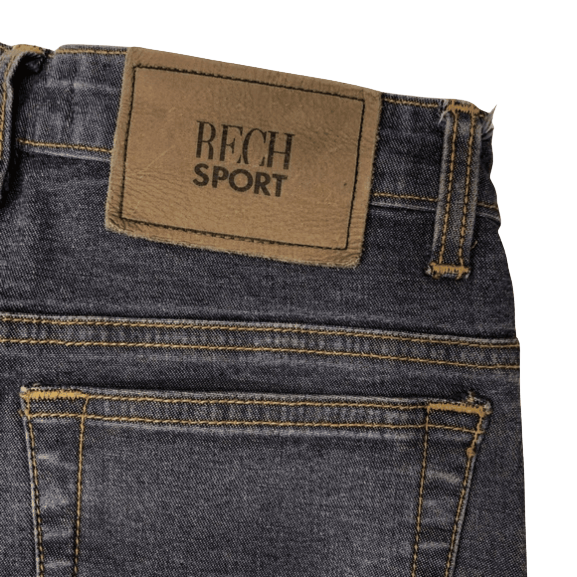 Close-up of a denim product with 'RECH SPORT' label on a transparent background