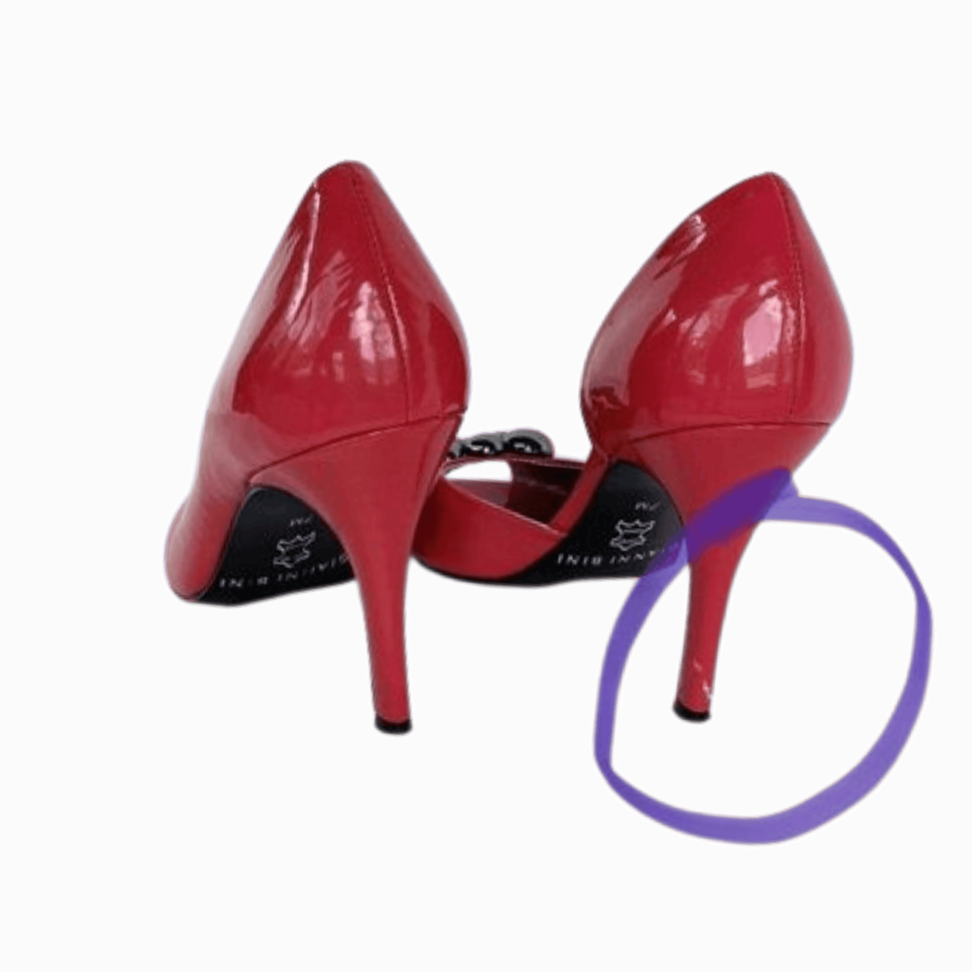 Red high-heeled shoes with a purple shoelace on a transparent background