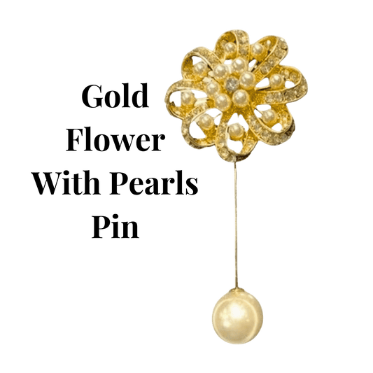 Gold flower with pearls pin on a green background