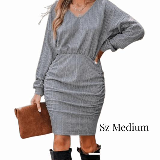 Gray dress worn by a model on a transparent background