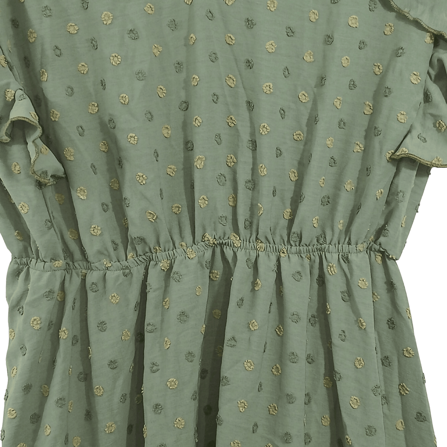 Green dress with floral pattern on a black background