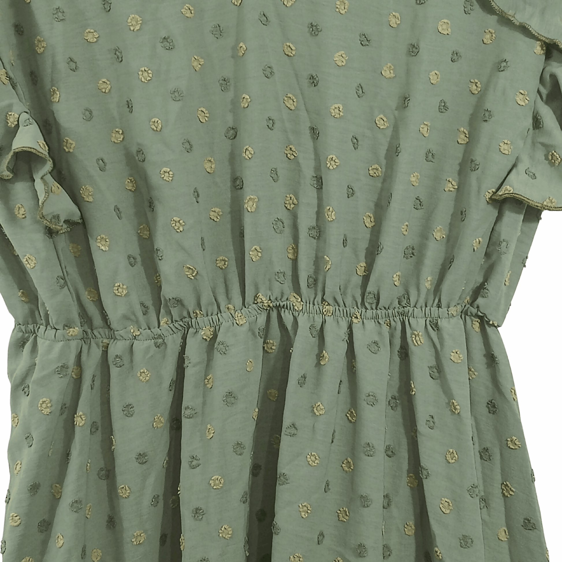 Green dress with floral pattern on a black background