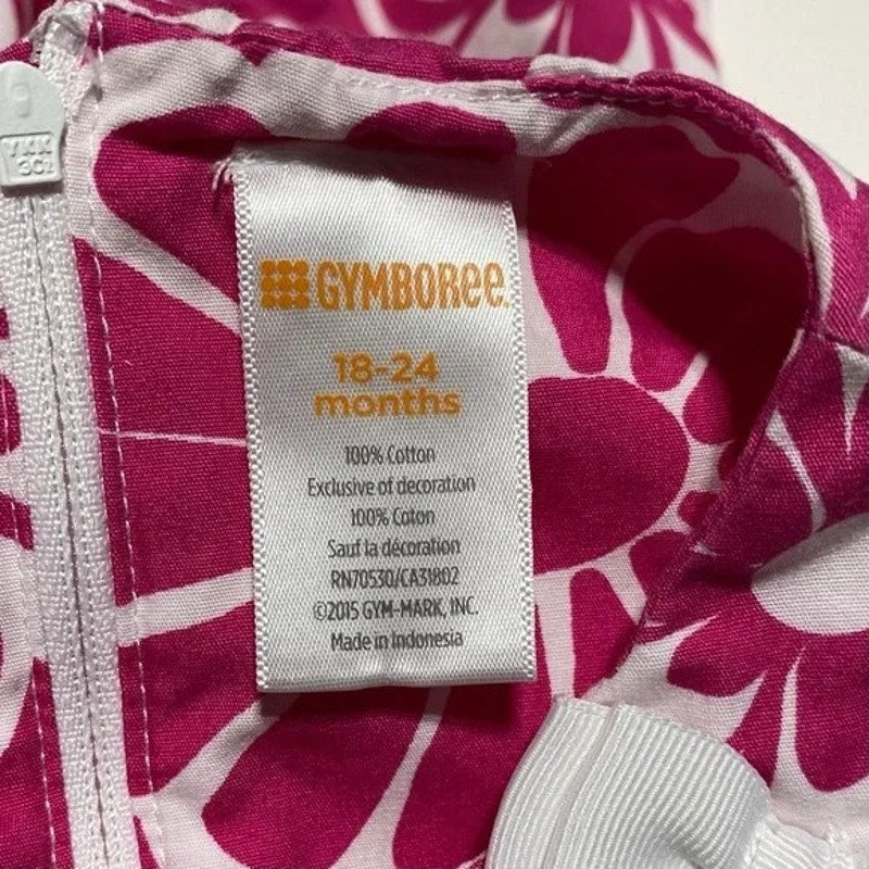 Gymboree label on a pink and white floral garment