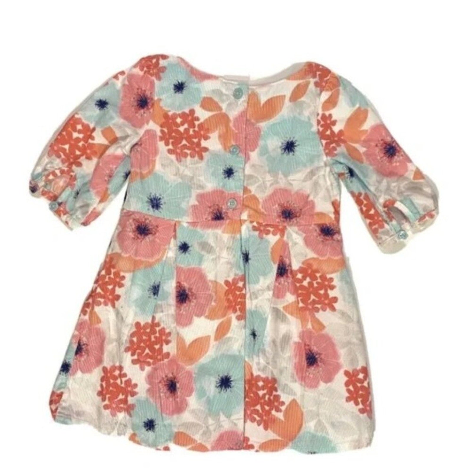 Floral patterned dress on a white background