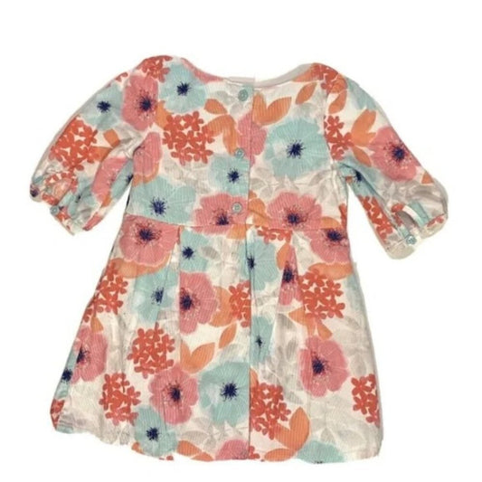 Floral patterned dress on a white background