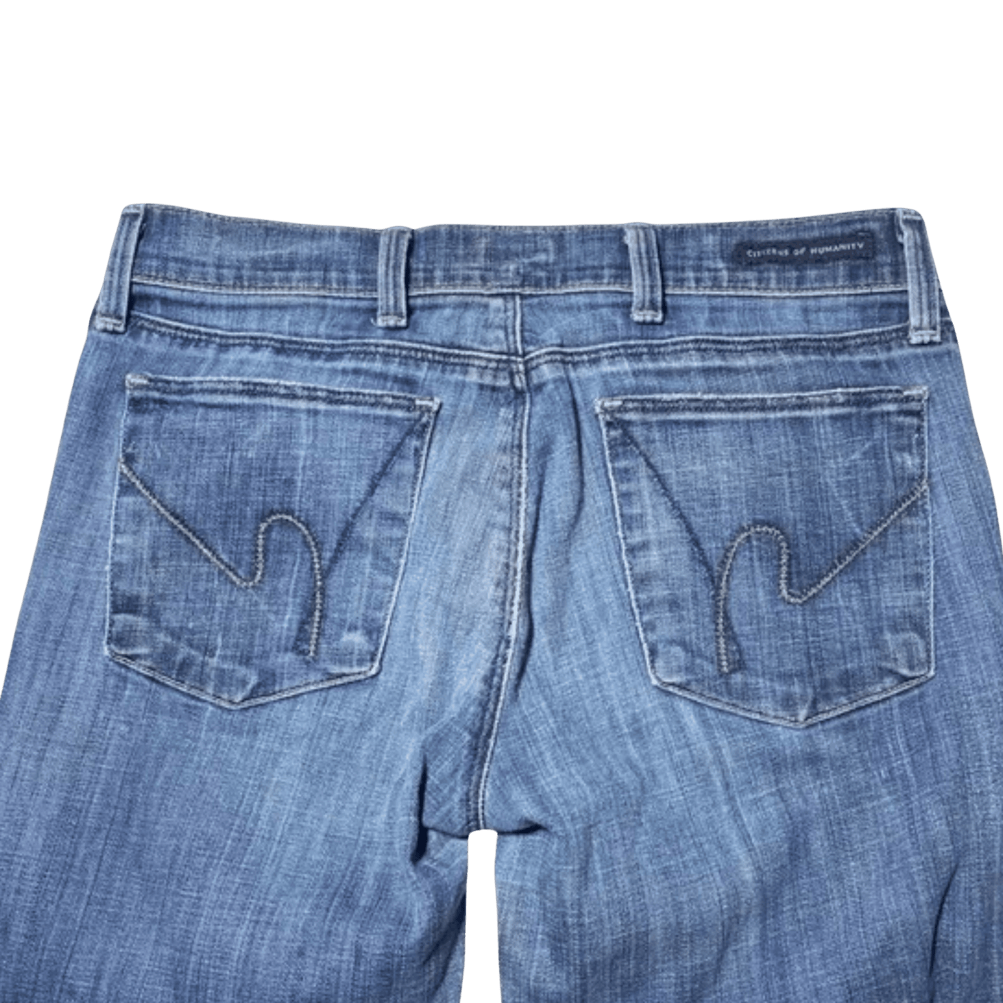 Back view of blue jeans with a visible brand label on a transparent background