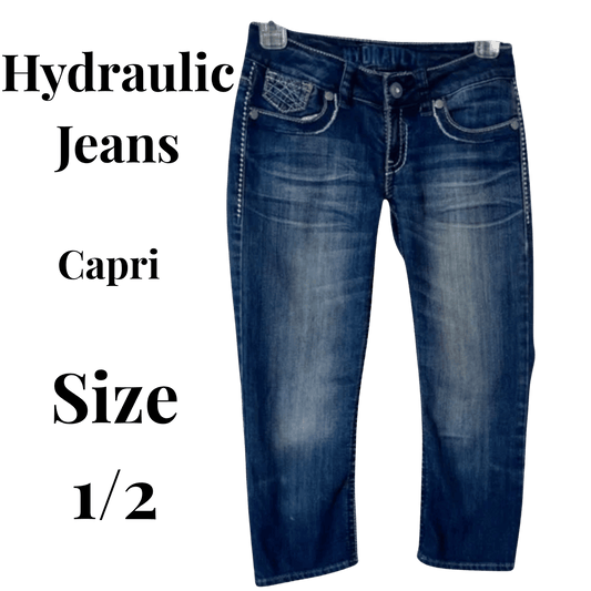 Blue capri jeans with 'Hydraulic Jeans' branding on a transparent background