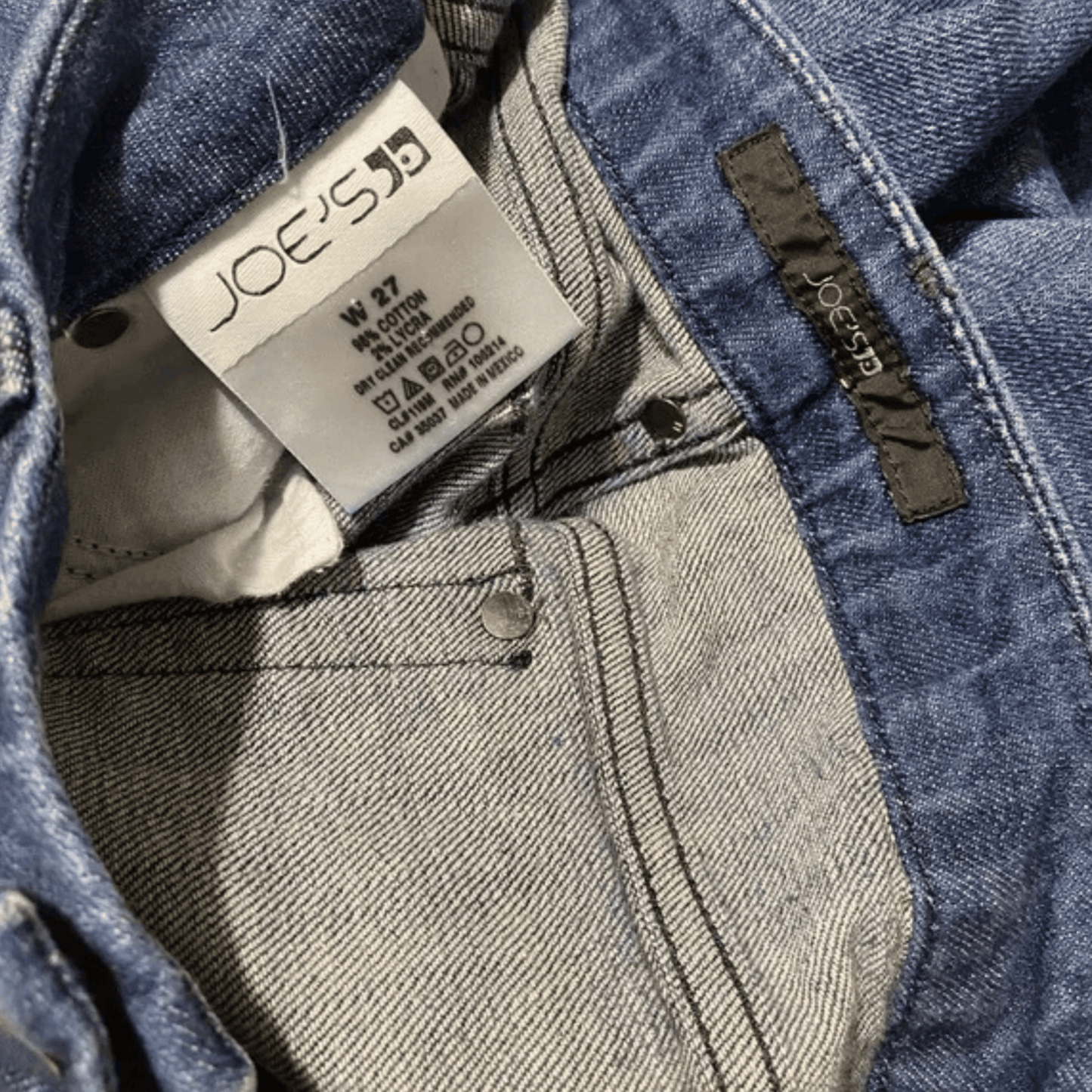 Close-up of Joe's jeans label on a denim fabric background