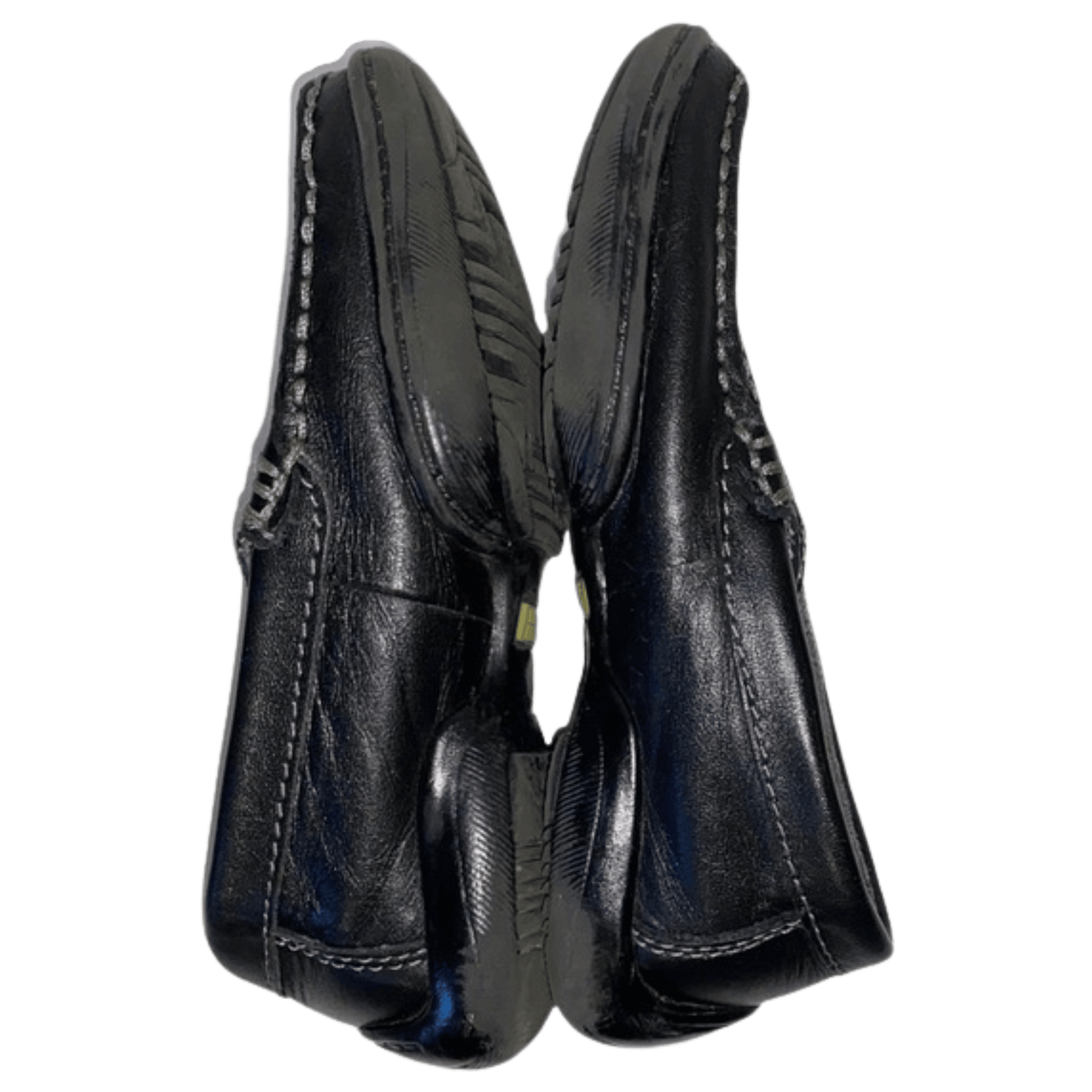 Pair of black leather shoes on a transparent background