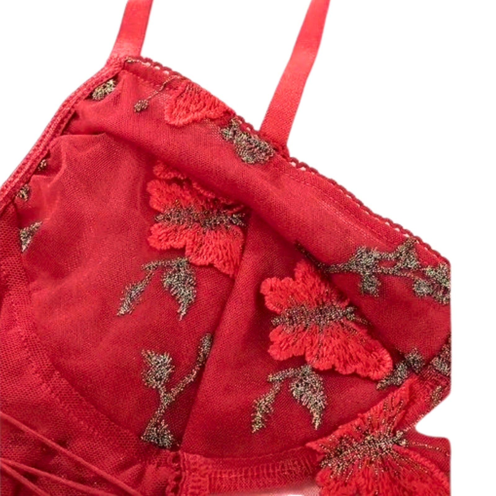 Red embroidered floral top on a white background