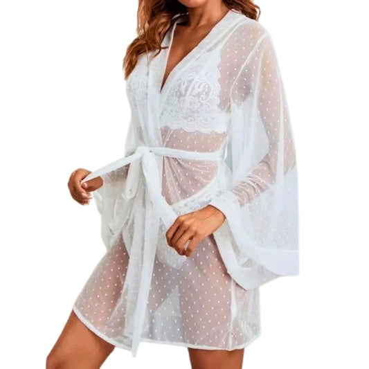 White sheer cover-up with polka dots on a white background