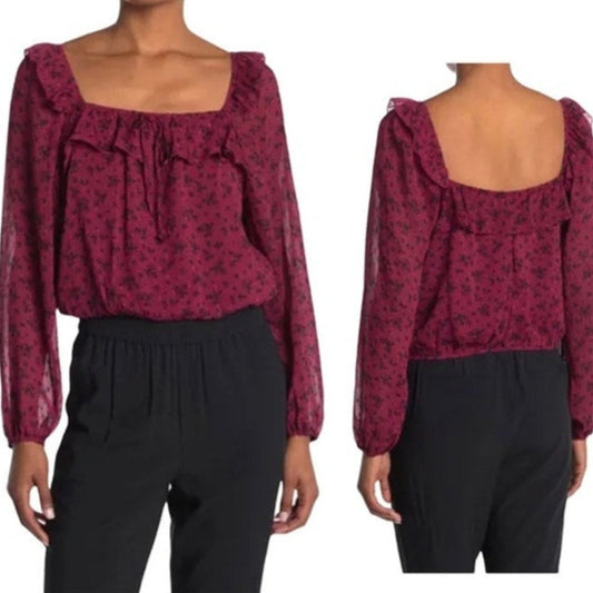 Red floral blouse with puff sleeves shown from front and back on a white background