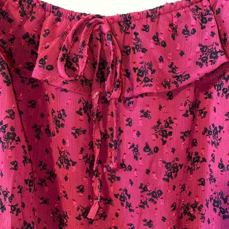 Pink floral dress with ruffled neckline