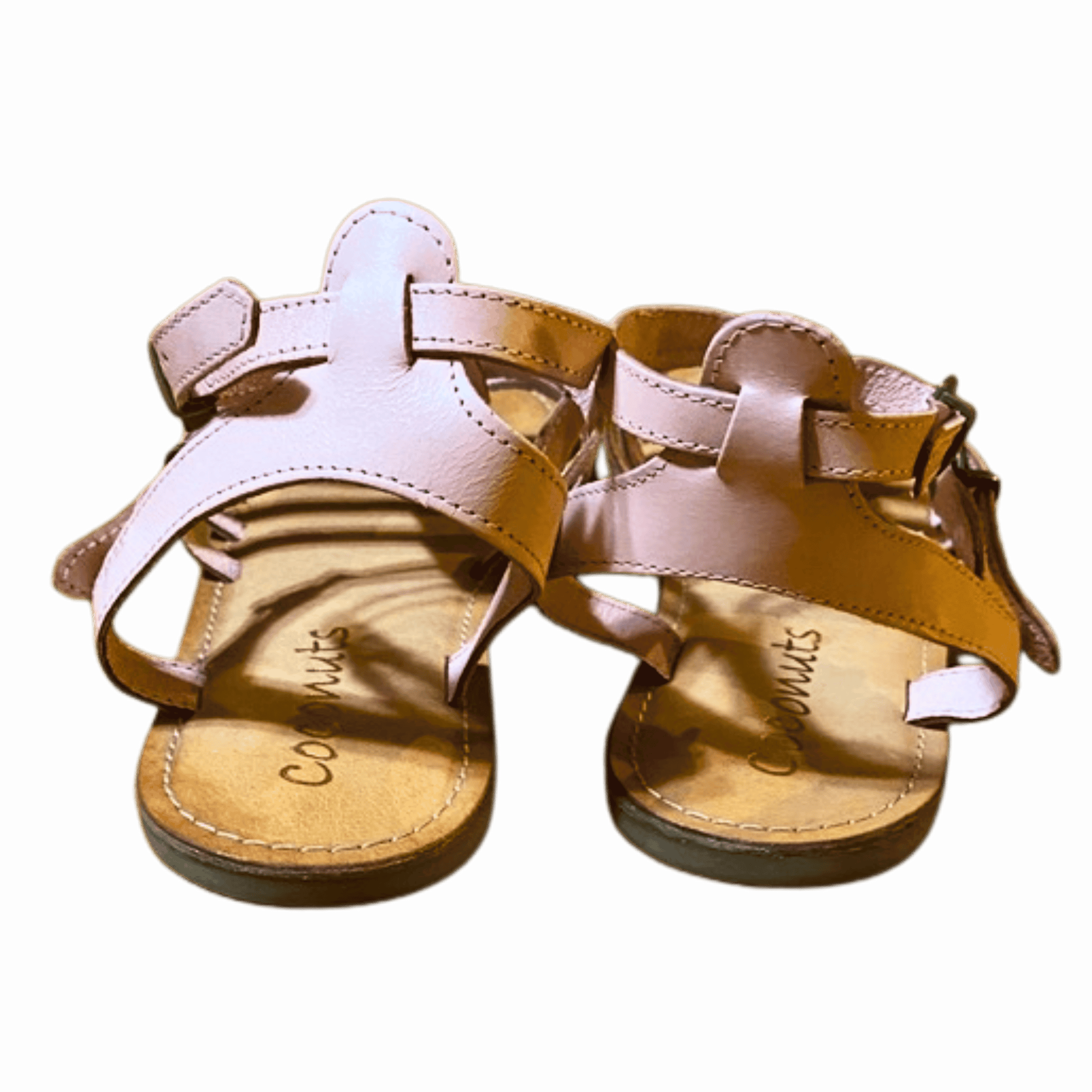 Pair of sandals with 'Coconuts' branding on a black background