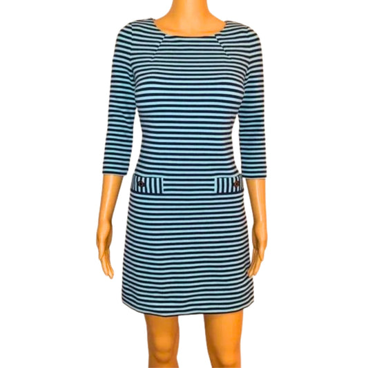 Mannequin wearing a blue and white striped dress on a white background
