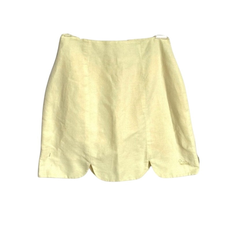 Light yellow shorts on a white background