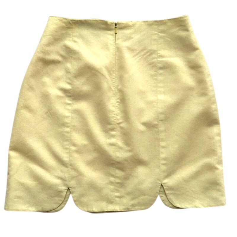 Light yellow shorts on a white background