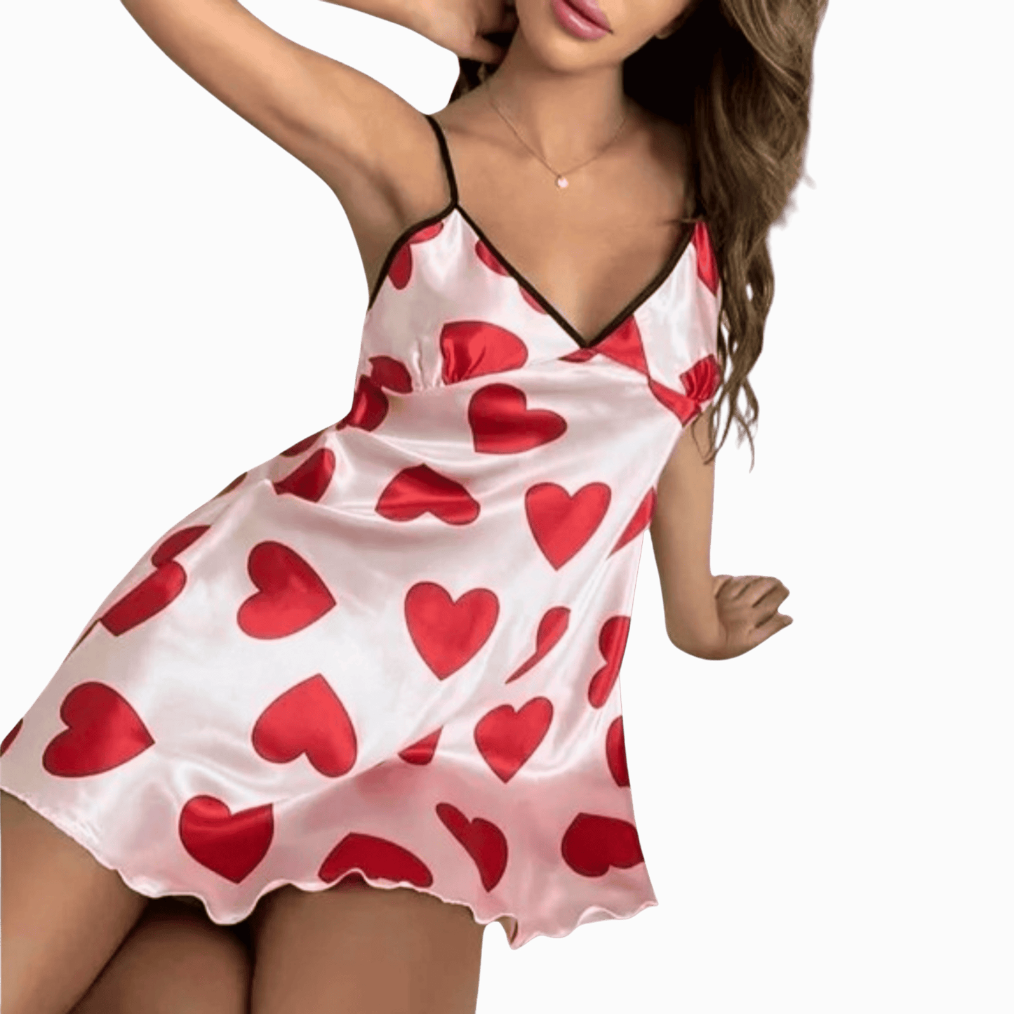 White satin nightgown with red heart patterns on a model against a dark background