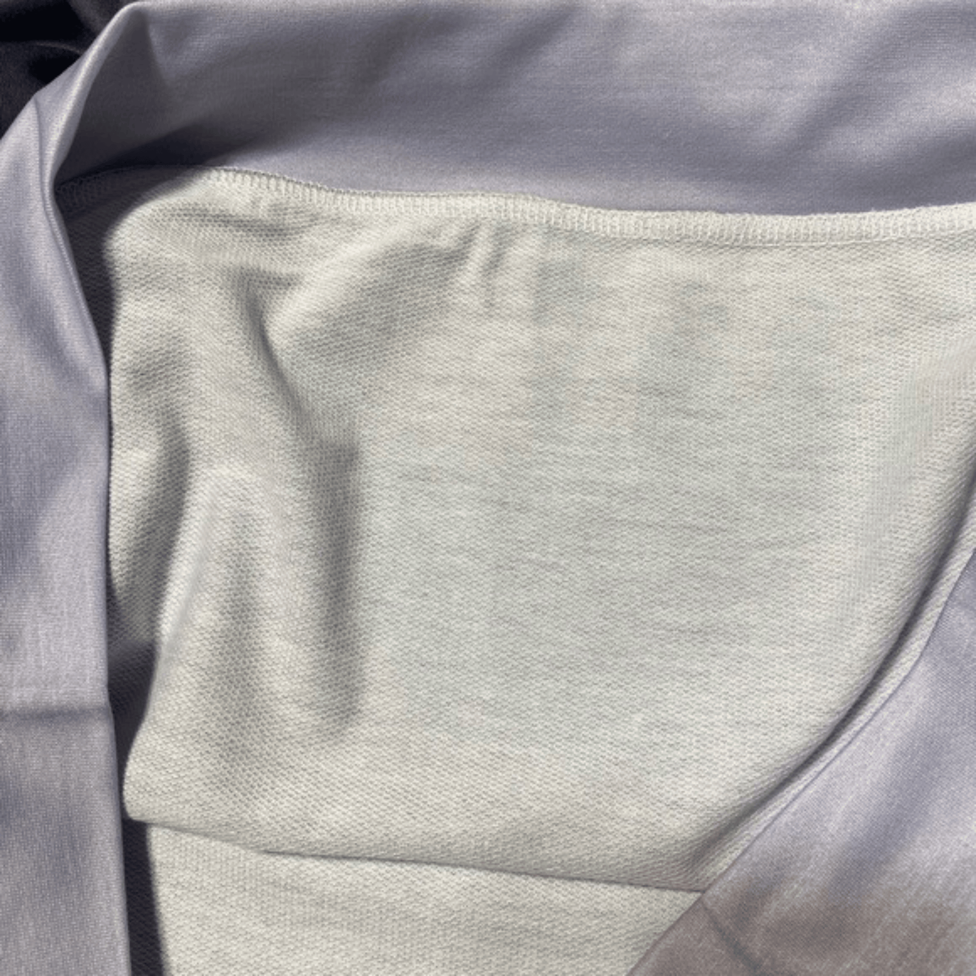 Close-up of gray fabric with a textured surface
