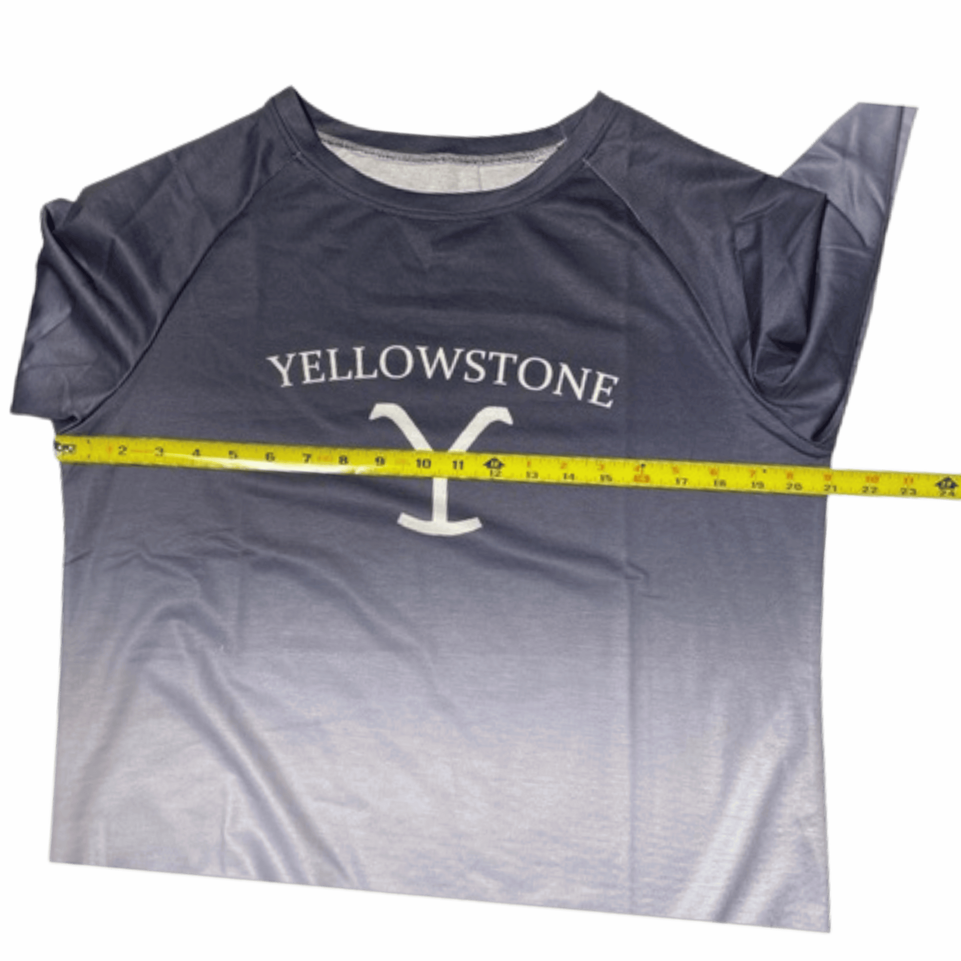 Gray t-shirt with 'Yellowstone' logo and measuring tape on a gray background