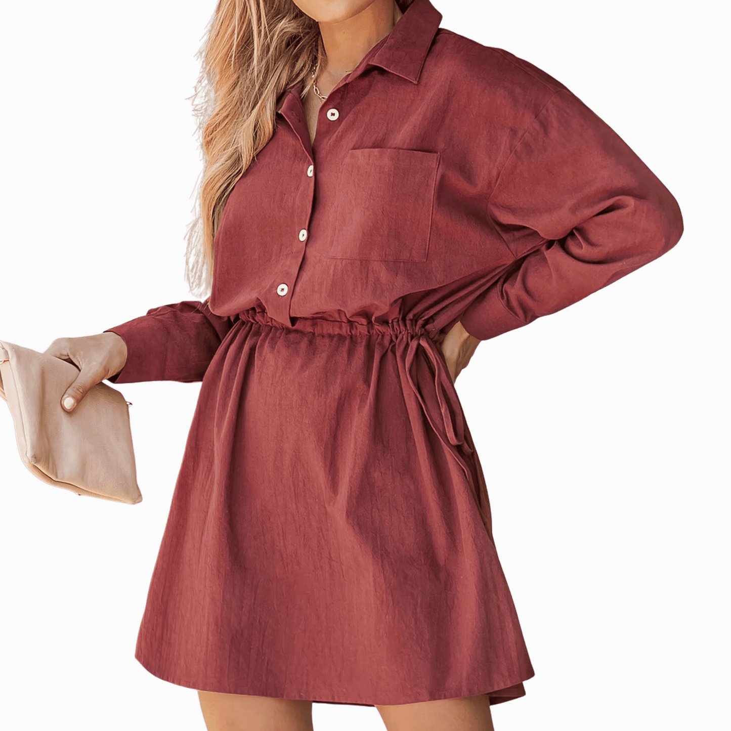 Red dress worn by a person on a dark red background