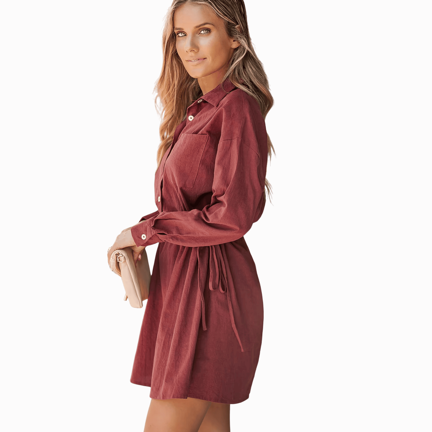 Woman wearing a burgundy dress against a matching background