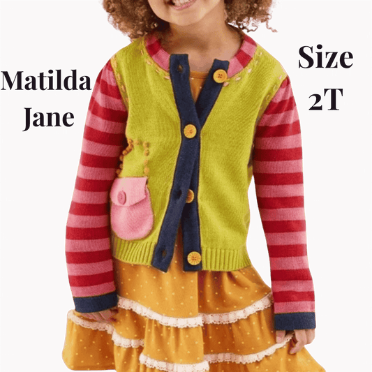 Child wearing a colorful outfit with a vest and striped shirt, branded 'Matilda Jane'.