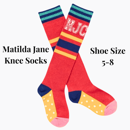 Colorful knee socks with 'MJC' branding on a dark background