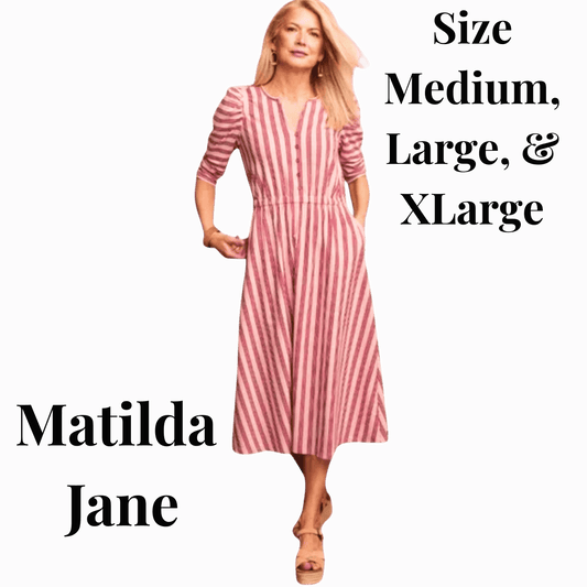 Woman wearing a pink and white striped dress on a purple background with text indicating size availability and brand name.