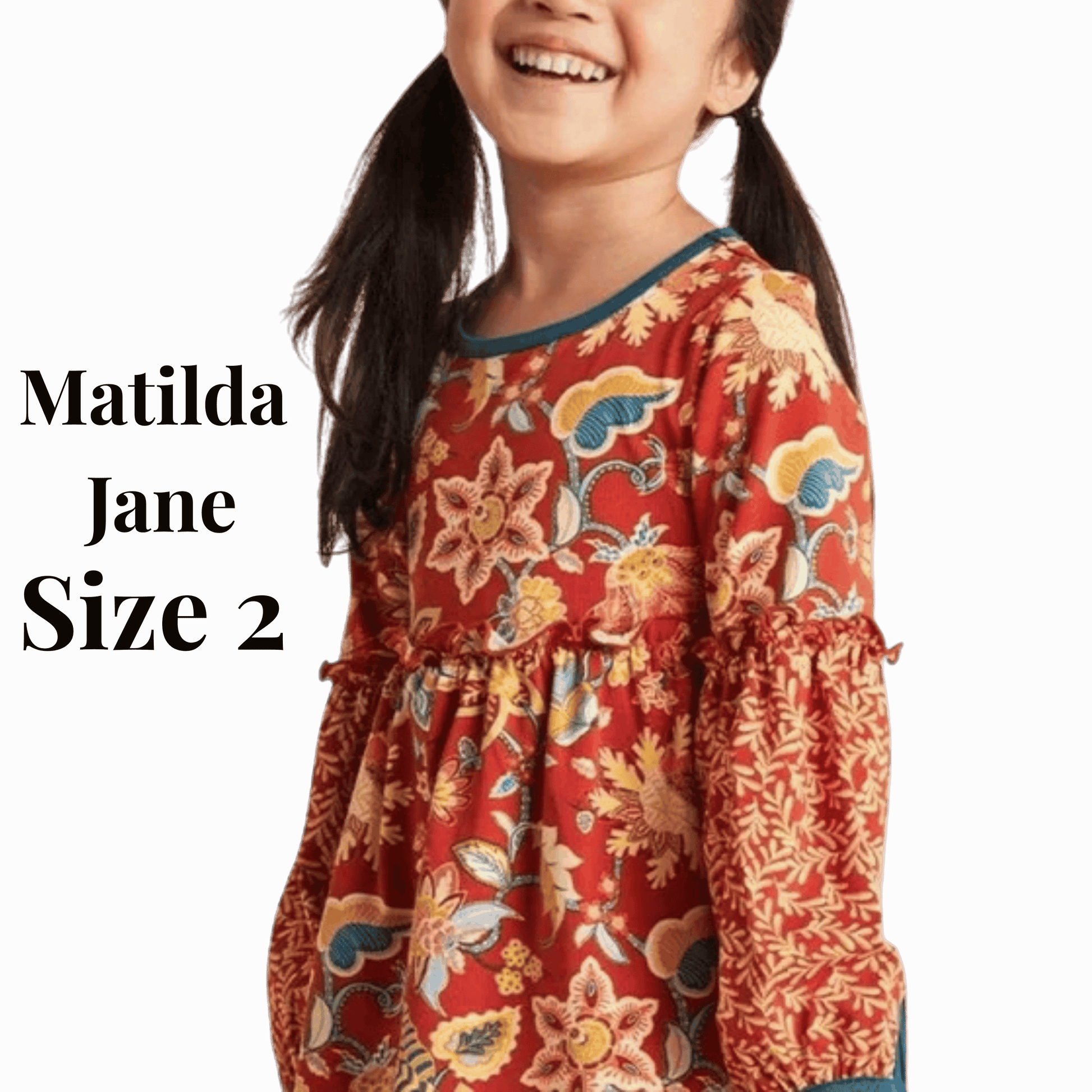Child wearing a red floral dress with 'Matilda Jane' branding on a red background