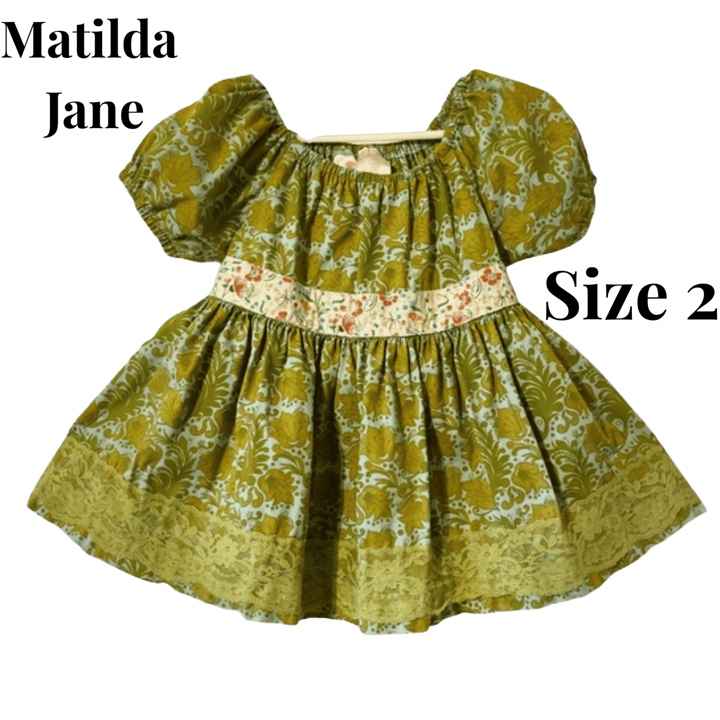 Children's dress with floral pattern on a green background, featuring 'Matilda Jane' brand.