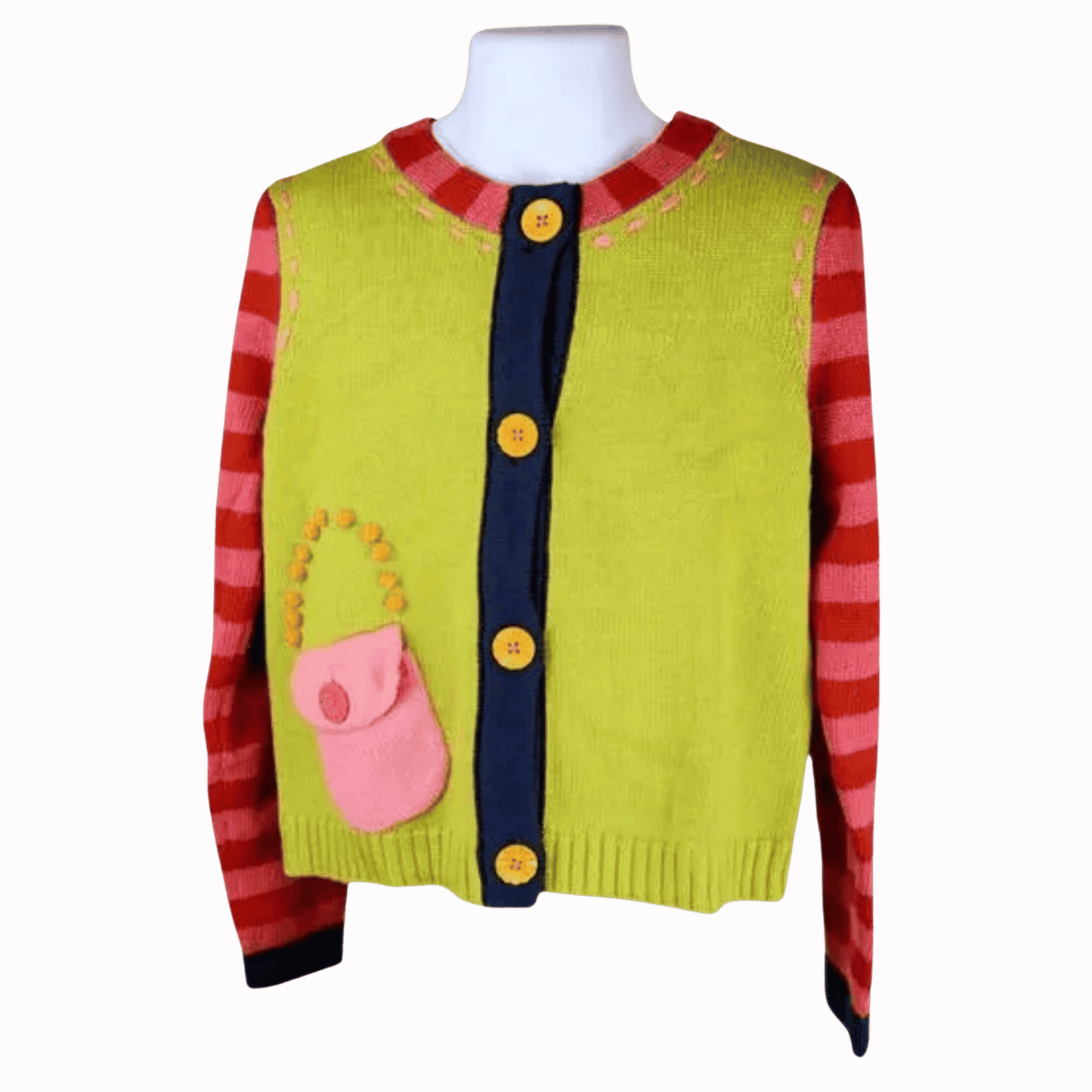 Colorful children's sweater vest on a mannequin against a red background