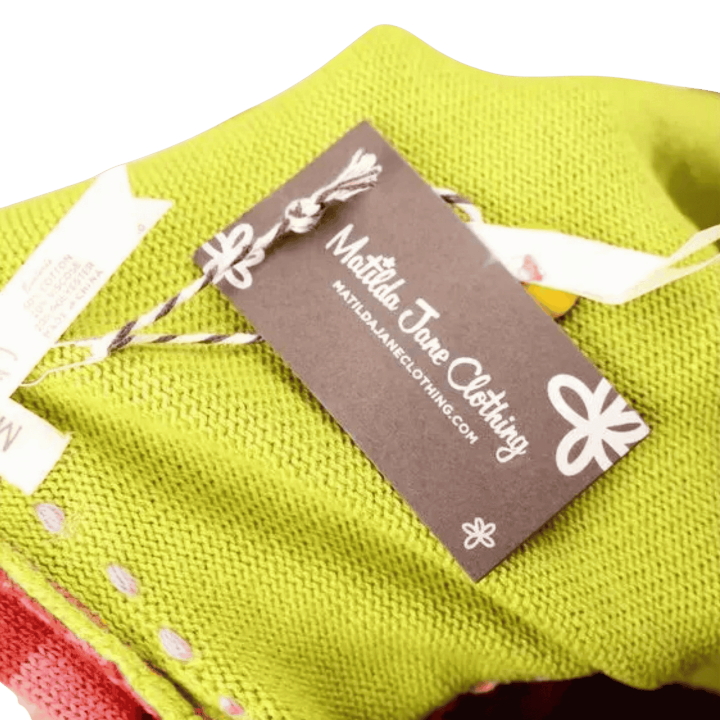 Green fabric with a 'Mattila Jane Clothing' tag on a green background