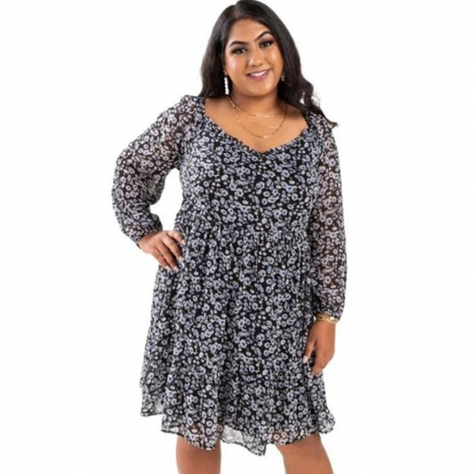 Woman wearing a floral dress on a white background