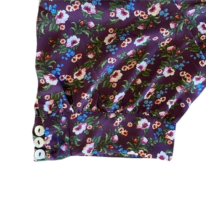 Floral-patterned fabric with colorful flowers on a purple background