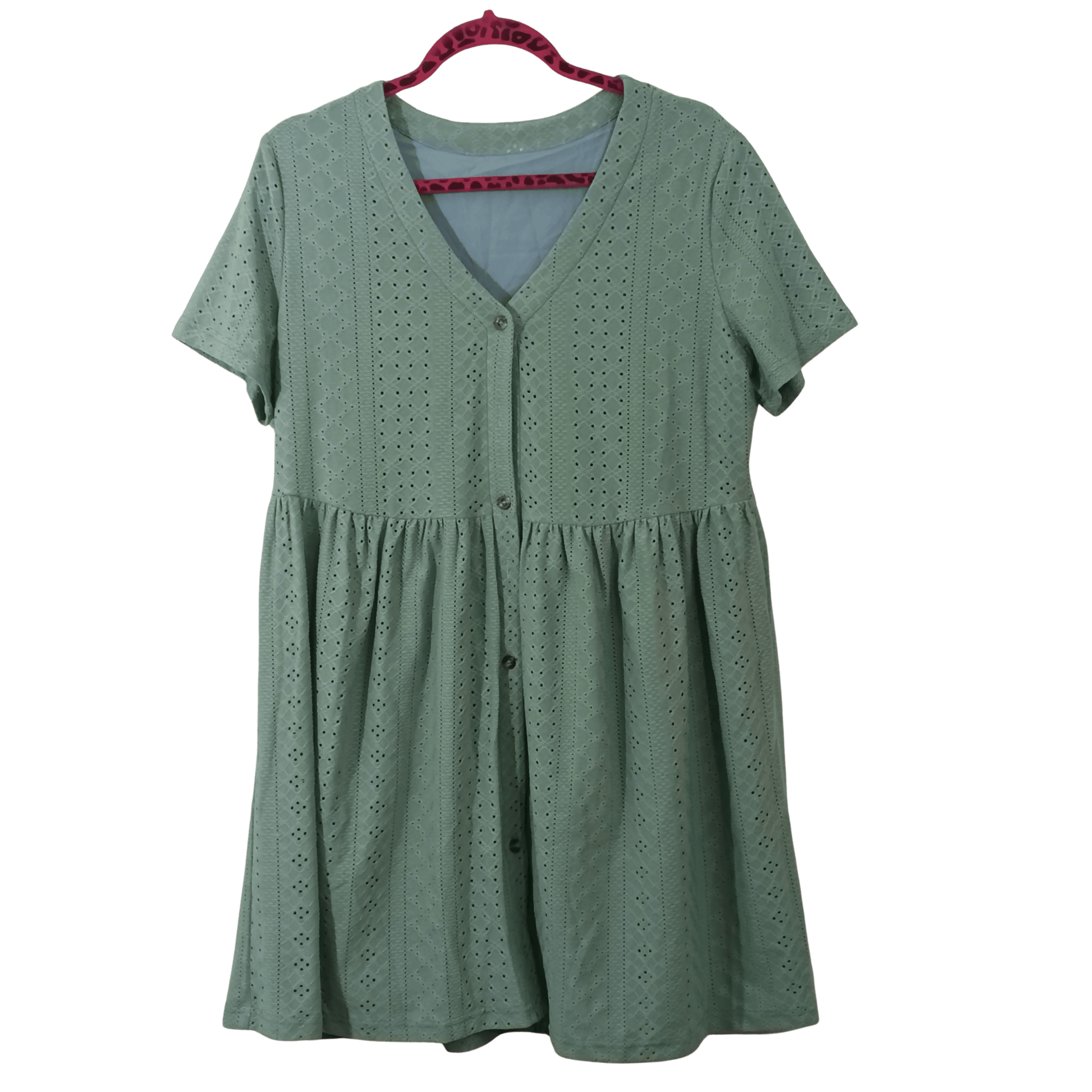 Green dress on a hanger with a transparent background