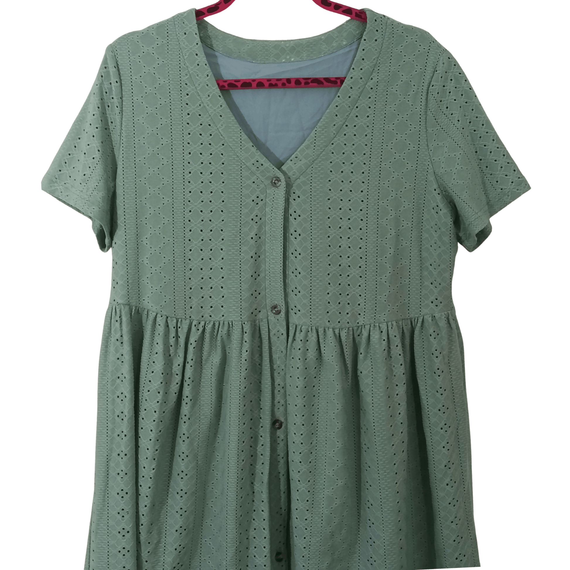 Green dress with button details on a transparent background