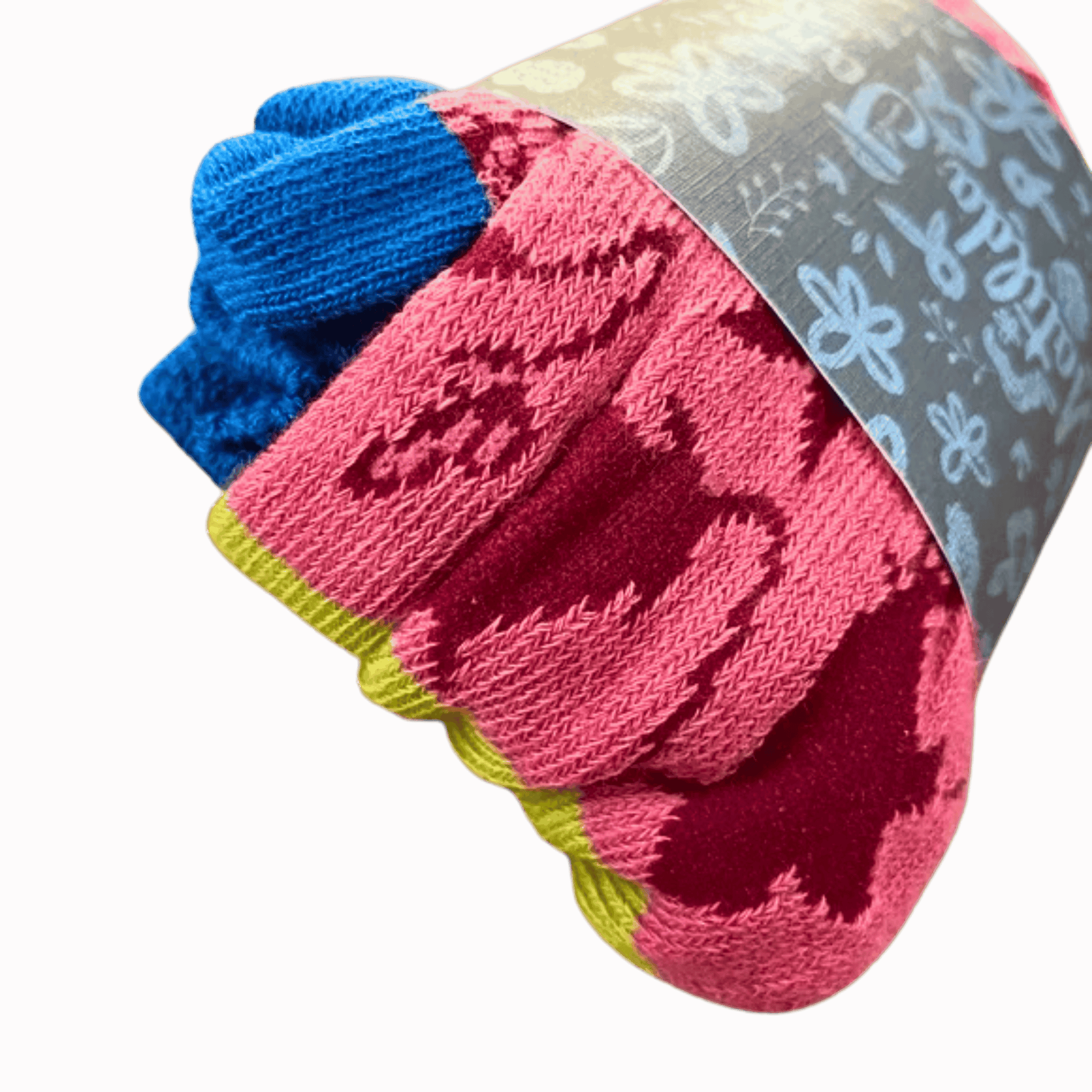 Colorful socks with a patterned band on a brown background