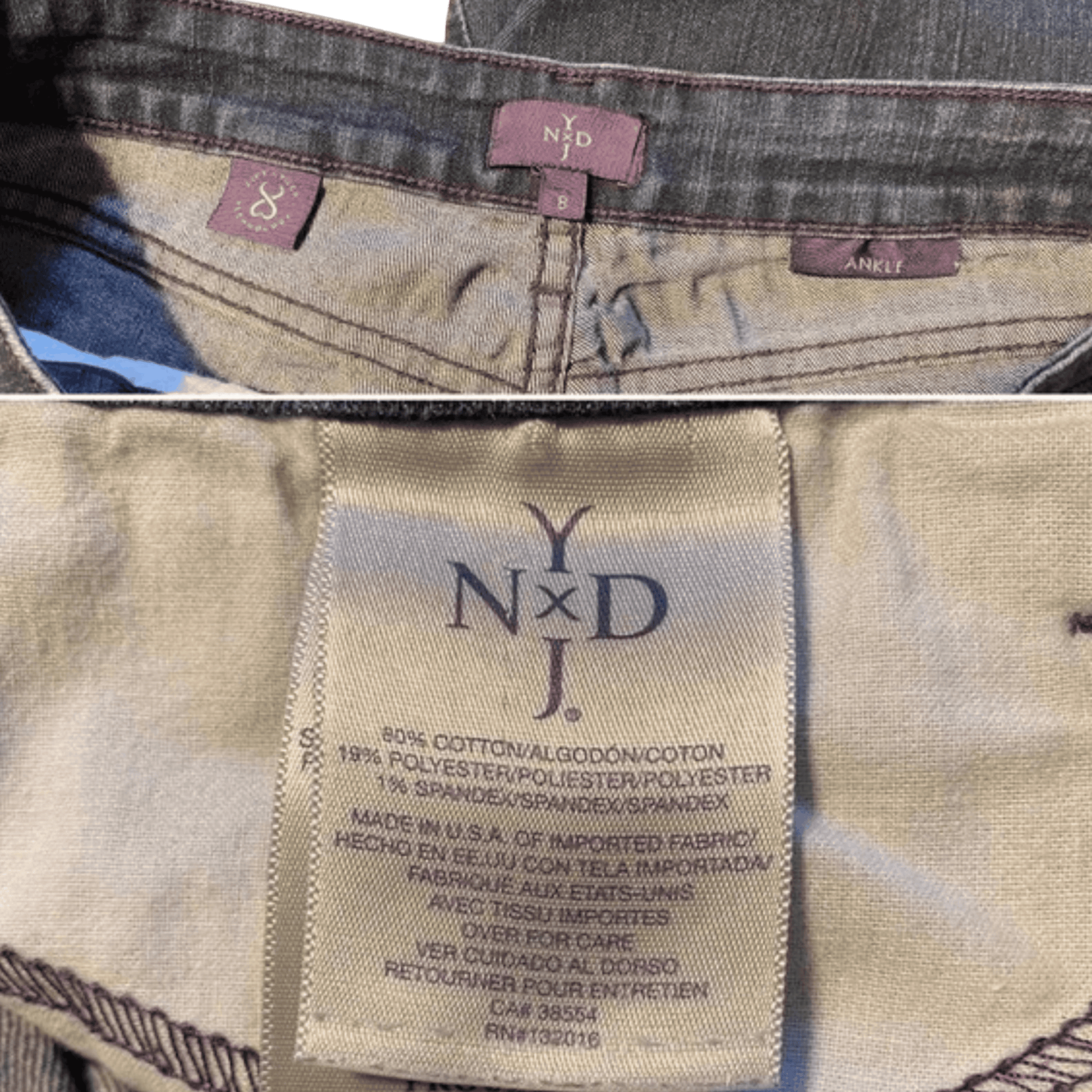 Close-up of a YXDJ label on a denim product with visible stitching and texture.