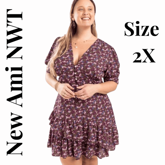 Woman wearing a floral dress with text indicating 'New Ami NWT' and 'Size 2X' on a red background.