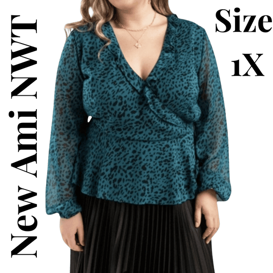 Teal leopard print blouse with a knot detail worn by a model on a transparent background.