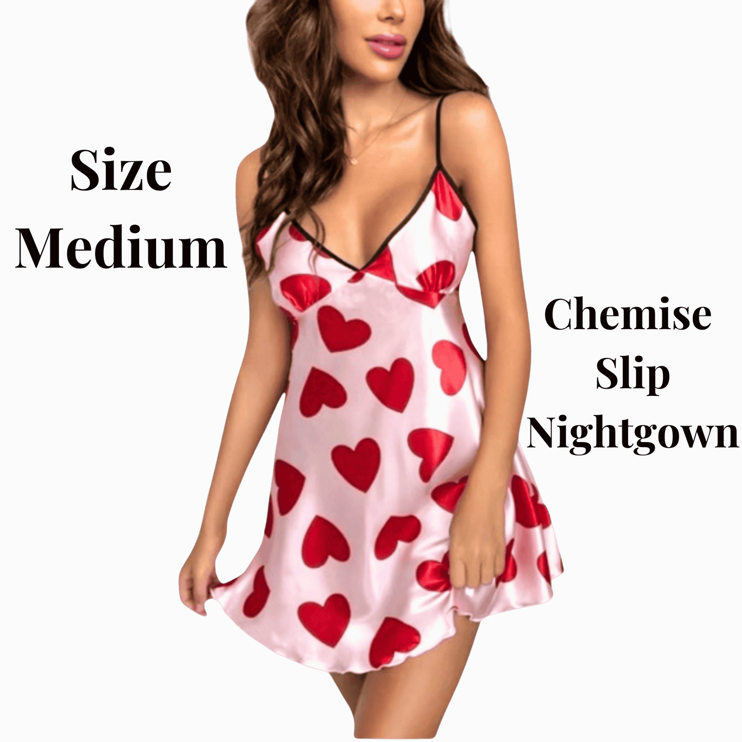 Woman wearing a pink nightgown with red heart patterns on a black background