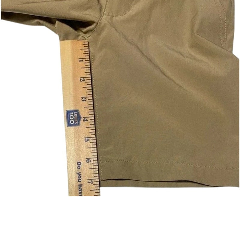 Brown fabric with a ruler for scale on a white background