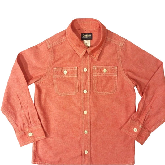 Red denim shirt with button details on a white background
